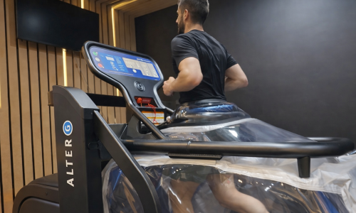 image of a client using a Alter G antigravity treadmill at our Newcastle Physio